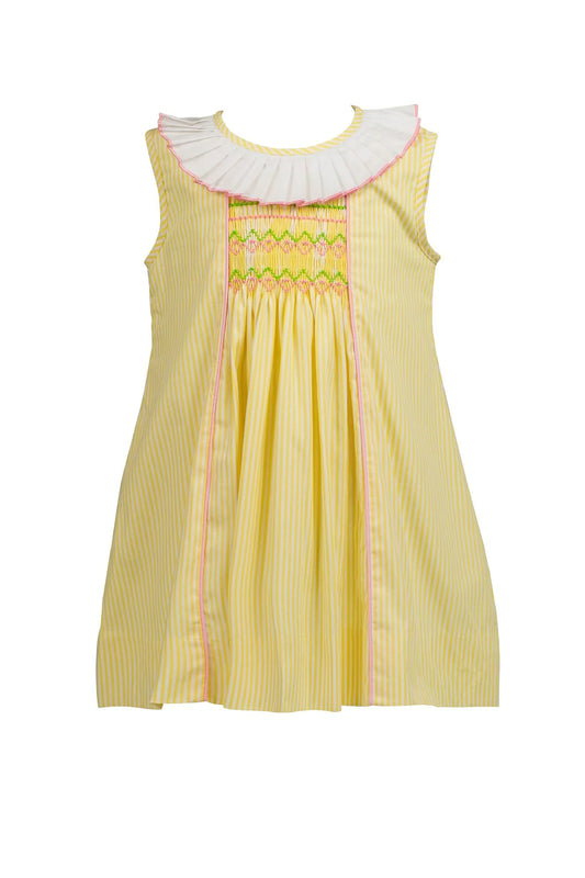 Yellow dress with white collar and colorful trim on a white background