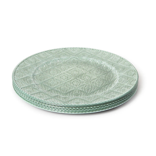 green patterned plates on a white background