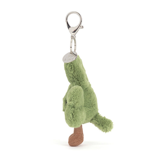 Green plush frog keychain on a white background