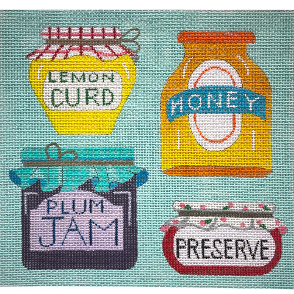 Four jars of different preserves with labels on a light blue background