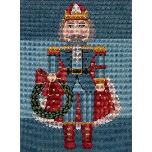 Decorative needlepoint of a character holding a wreath on a blue background