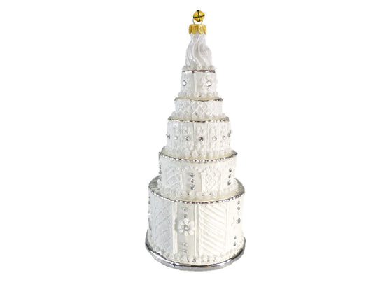 Decorative white tower with a gold top on a white background
