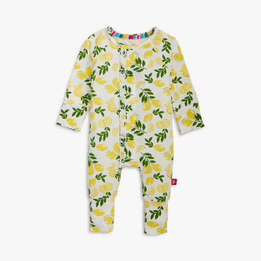 Baby onesie with lemon pattern on a white background
