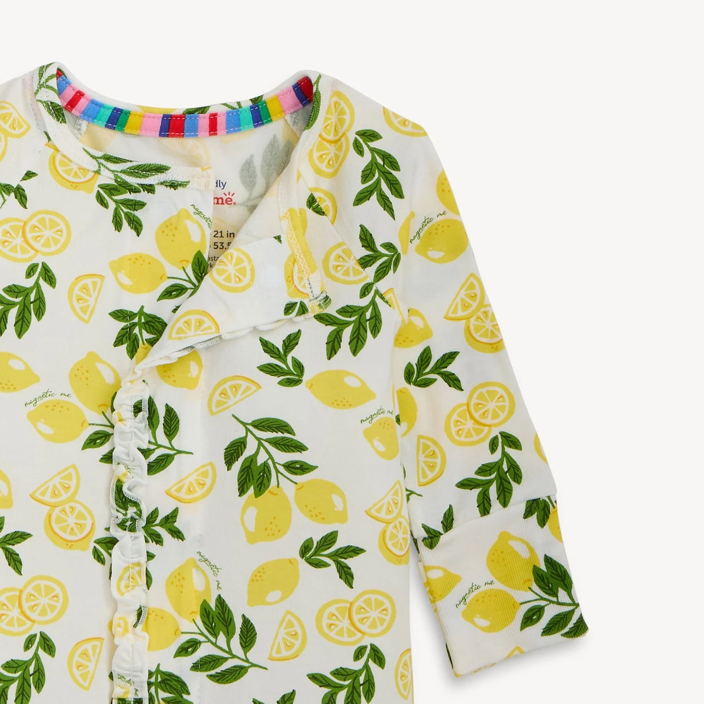 Baby onesie with lemon pattern on a white background