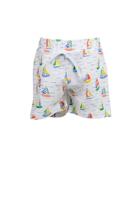 Children's shorts with sailboat pattern on a white background