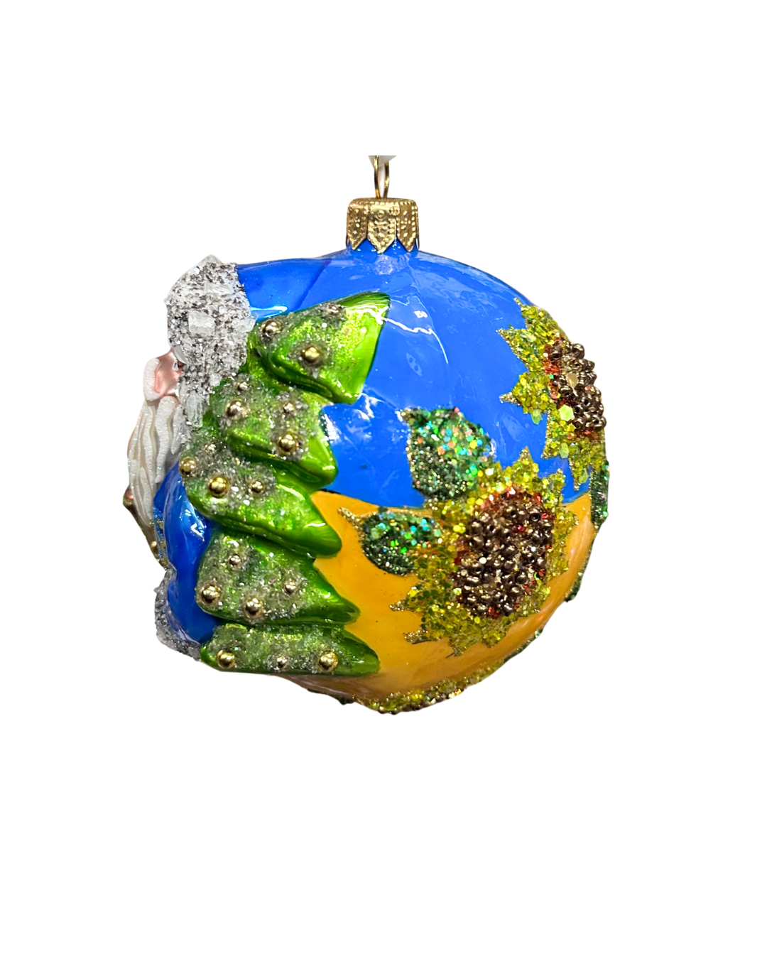 Decorative ornament resembling a globe with greenery and blue sky on a white background