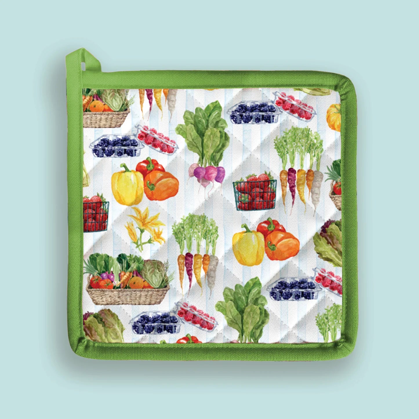 Potholder with colorful vegetable pattern on a light blue background
