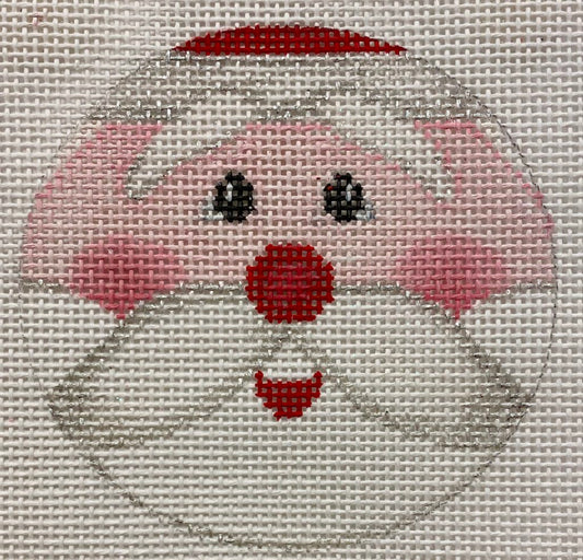 Cross-stitched design of a dog's face on fabric