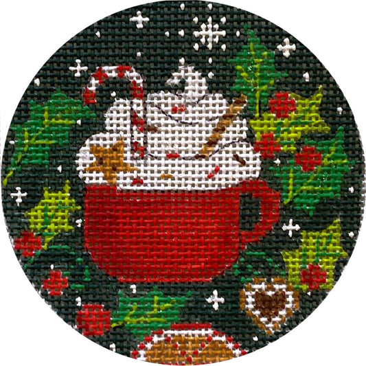 Decorative needlepoint of a red mug with hot chocolate, candy canes, and gingerbread men on a black background.