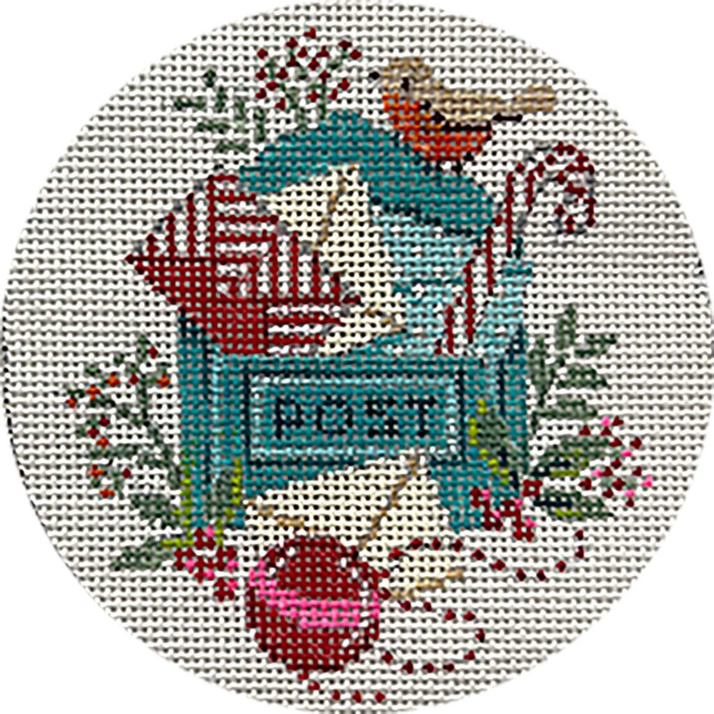 Circular needlepoint design with a bird, candy cane, and holly on a white background