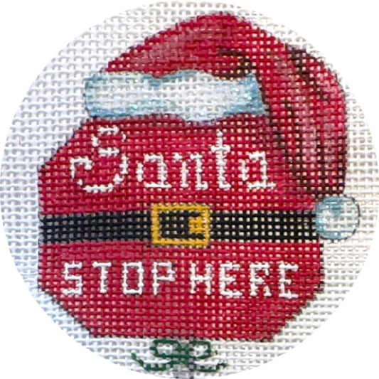 Decorative plate with Santa Claus design and 'Santa Stop Here' text on a white background