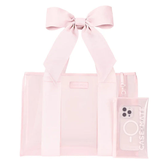 Pink tote bag with a bow and a phone case on a white background