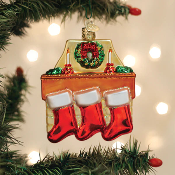 Family of three stockings on fireplace mantel glass ornament Old World Christmas