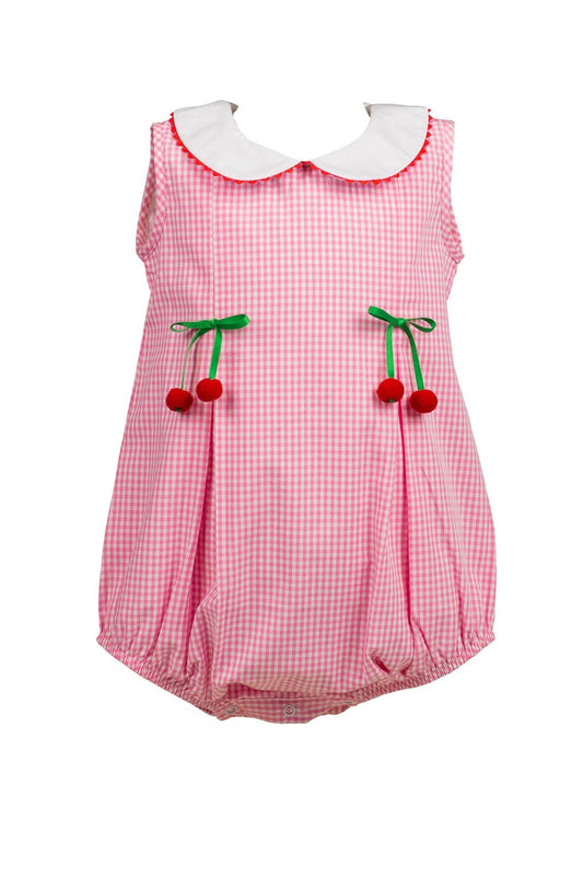 Pink checkered baby romper with cherry details on a white background