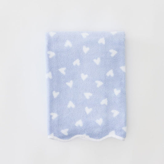 Light blue fabric with white heart pattern on a light gray background