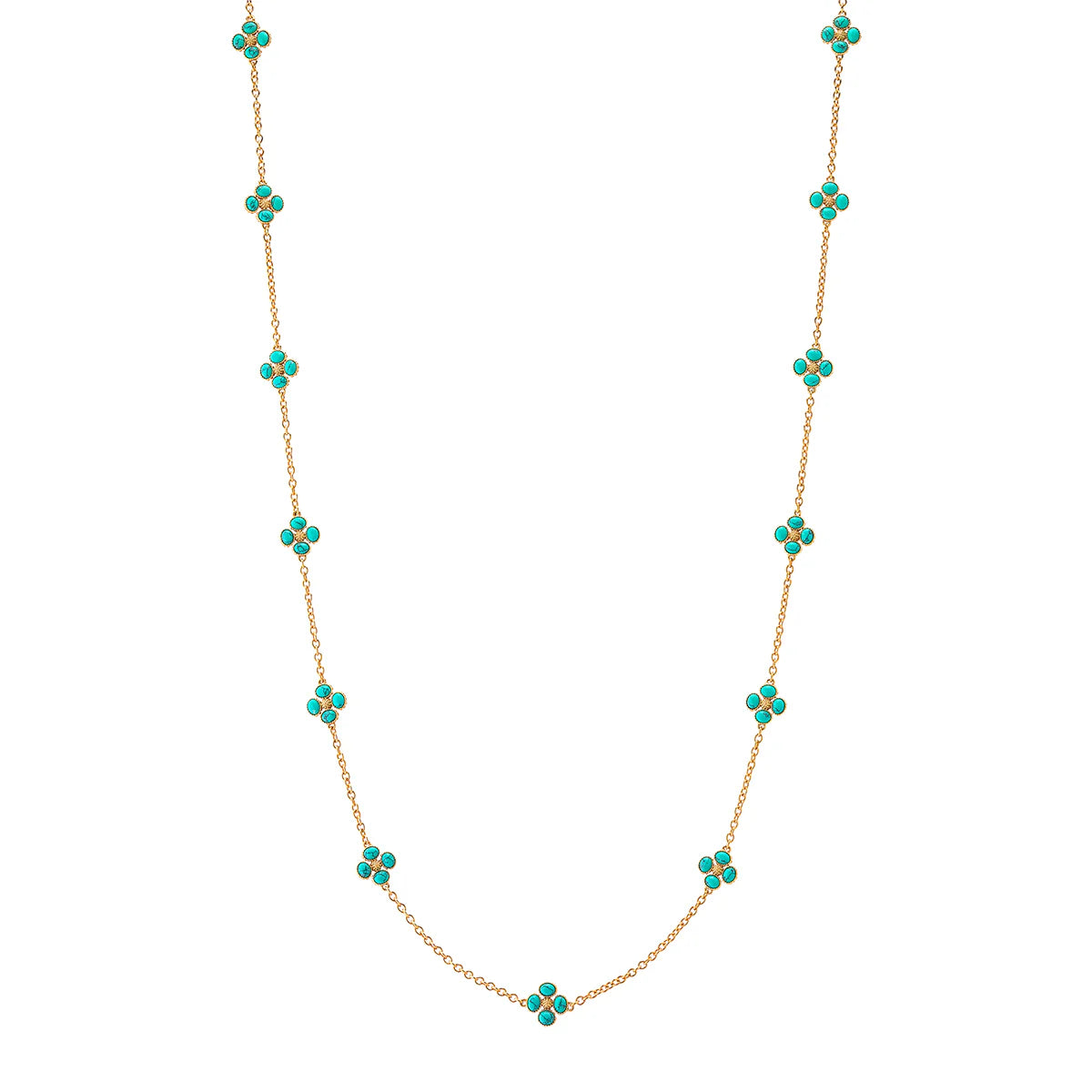 Gold necklace with turquoise stones on a white background