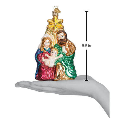 Decorative nativity scene ornament with measurement on a white background
