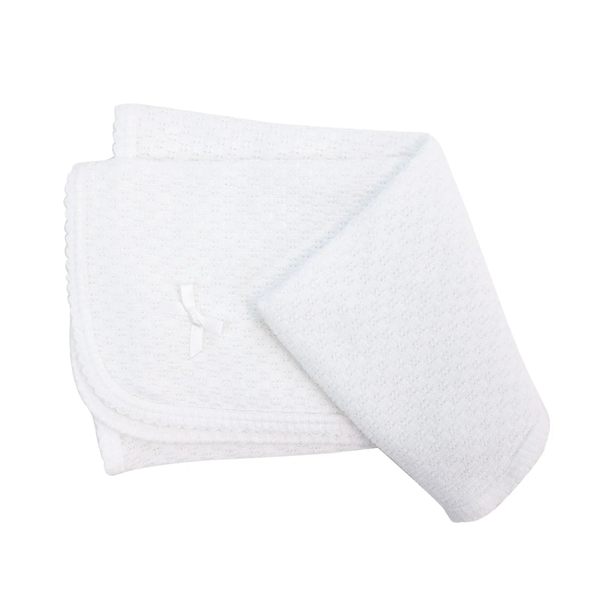 white baby blanket with small bow