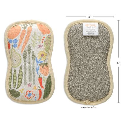 Two pads, one with a colorful vegetable pattern and the other with a textured surface, on a white background.