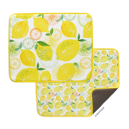 Two decorative mats with lemon pattern on a white background