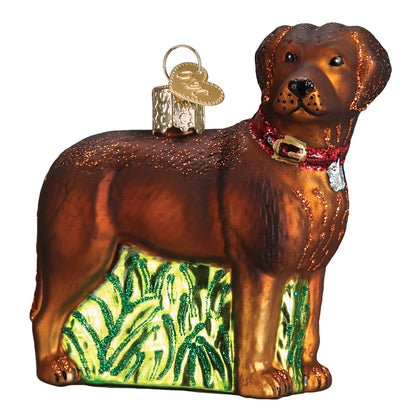 Glass ornament of a brown dog with a collar on a white background