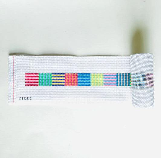 needlepoint canvas with colorful stripes on a white background