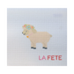 needlepoint  sheep design with 'LA FETE' text on a light blue background