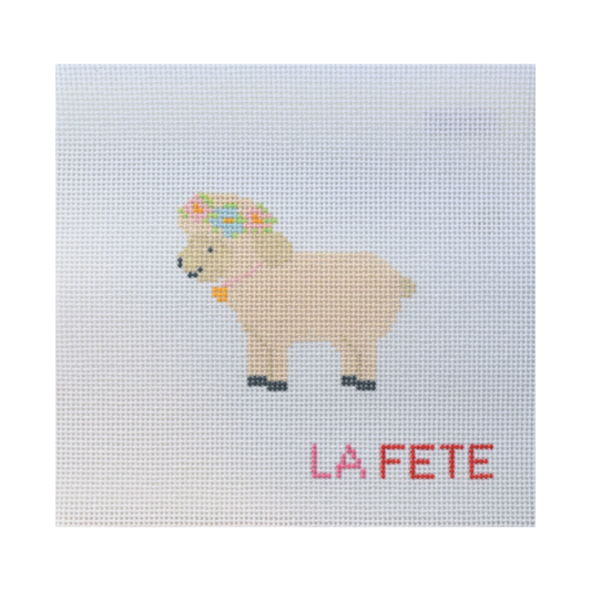 needlepoint  sheep design with 'LA FETE' text on a light blue background