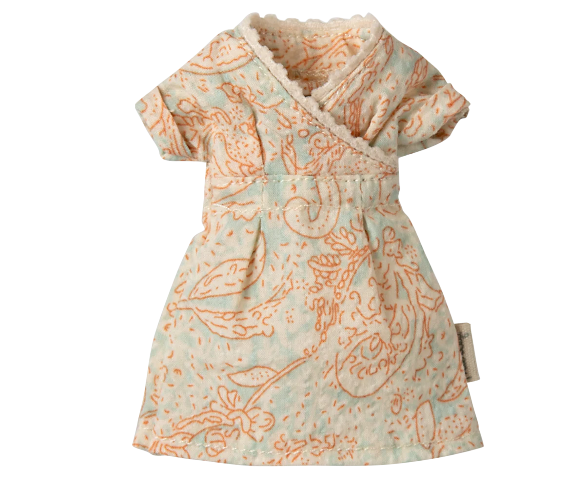 Patterned baby dress on a white background