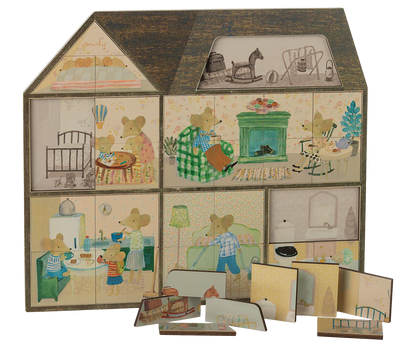 Children's house-shaped puzzle with illustrated rooms on each piece.