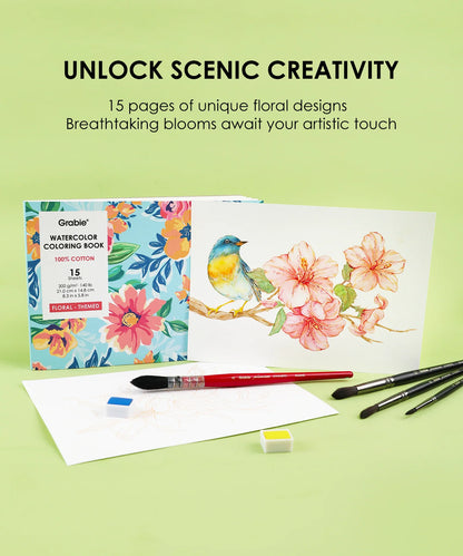 Watercolor coloring book with floral designs, brushes, and a paint palette on a green background.