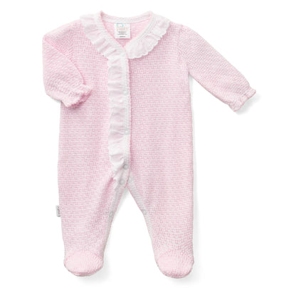 A light pink textured knit baby footed sleeper with long sleeves, a ruffled collar, and a ruffled front placket, shown on a plain white background.