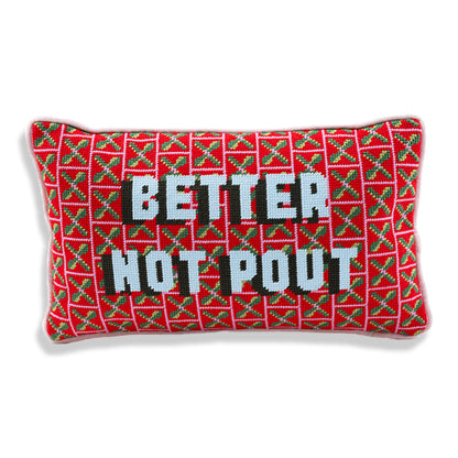 Decorative pillow with red and green pattern and text 'Better Not Pout' on a white background