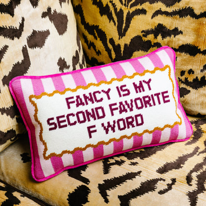 Decorative pillow with text on a patterned background