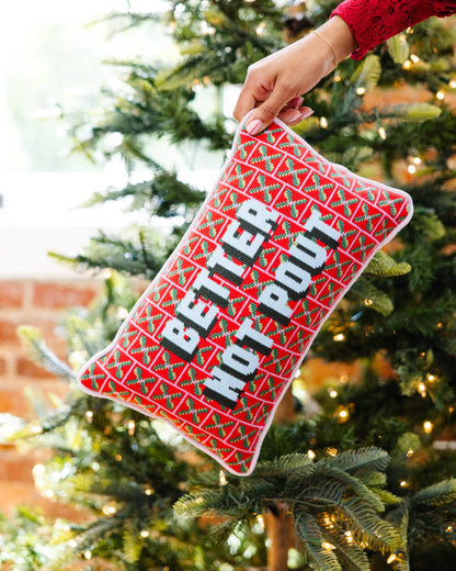 Red and green stocking with 'Better Hot Poll' text hanging from a Christmas tree.