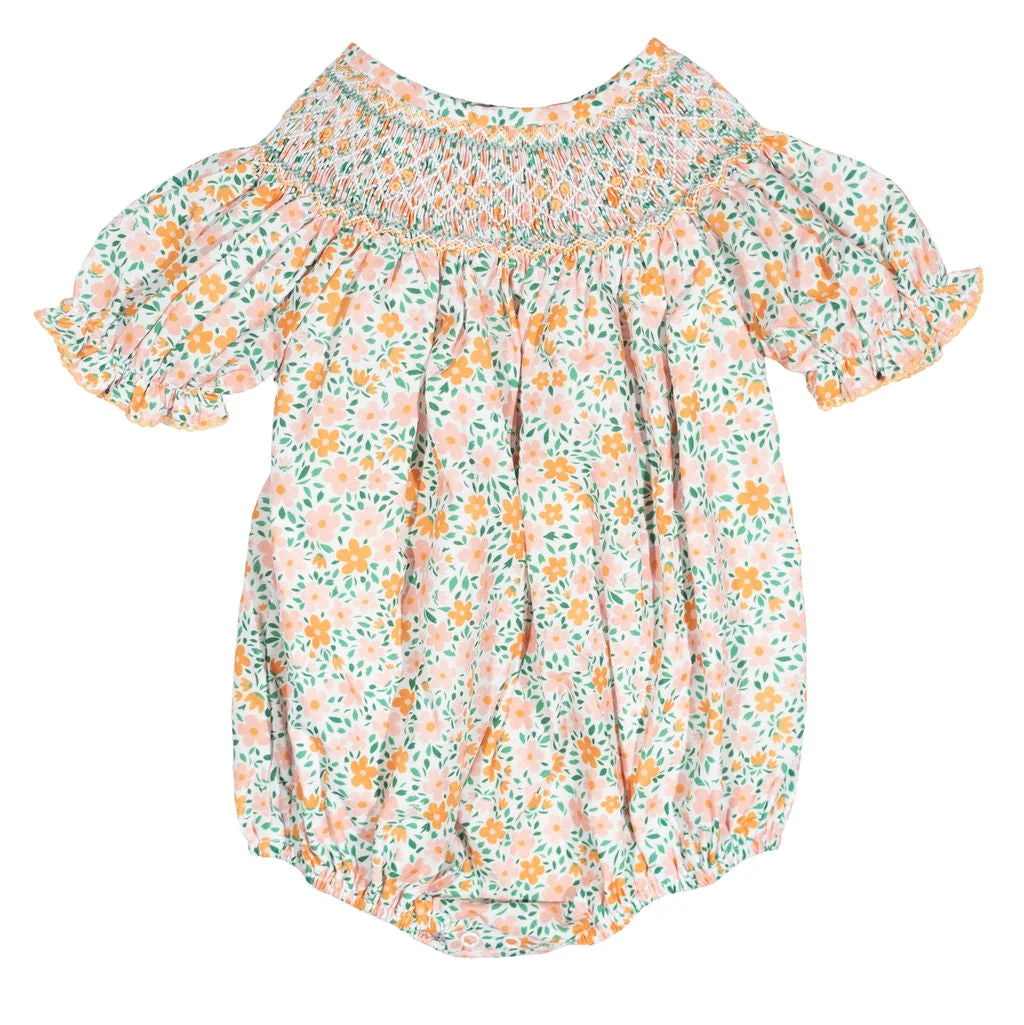 Floral baby romper on a white background