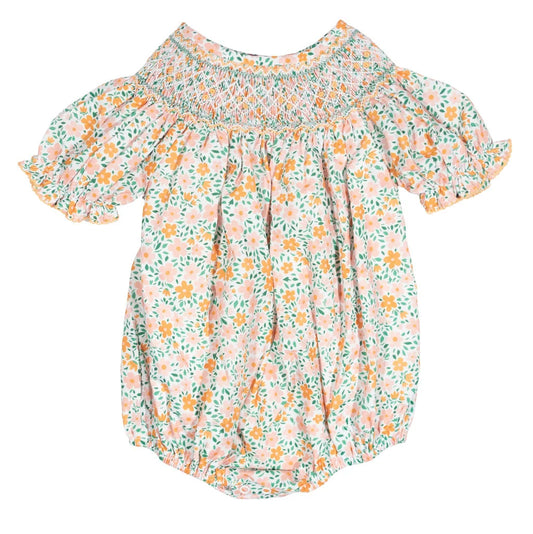 Floral baby romper on a white background