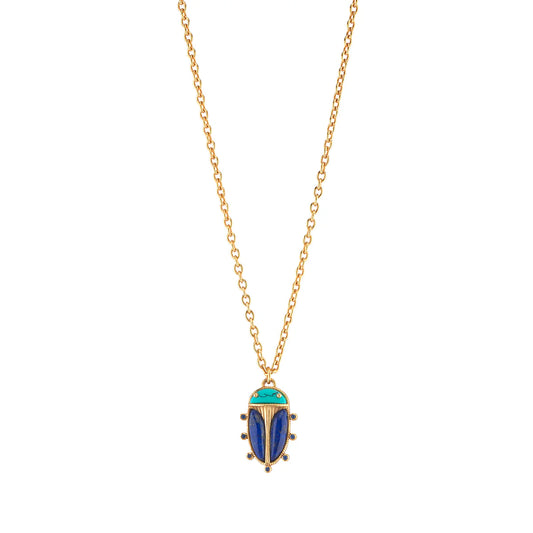 Gold necklace with a beetle-shaped pendant on a white background