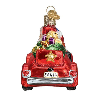Old World Christmas Santa in Antique Car ornament 