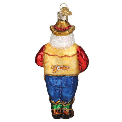 Decorative glass ornament of a character in a yellow vest with a red shirt and blue pants on a white background.
