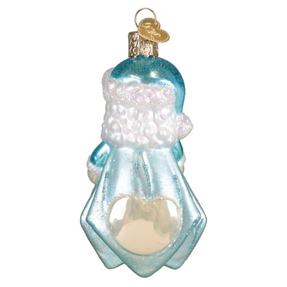 Glass ornament of a blue and white character with a heart on a white background