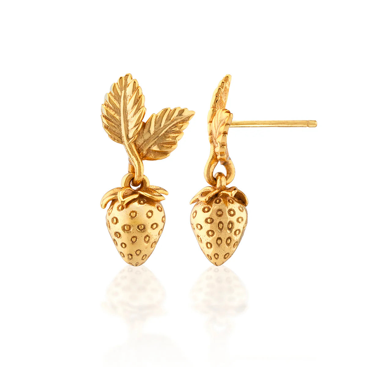 Gold strawberry-shaped earrings on a white background
