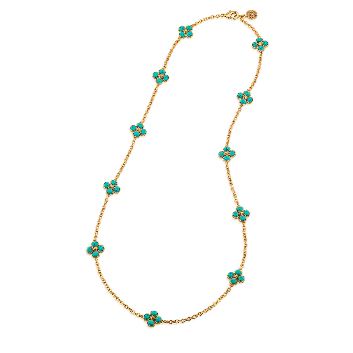 Gold necklace with turquoise flower-shaped stones on a white background