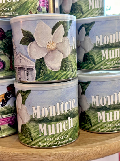 Cans of Moultrie Munch cat food with a floral design on the label.