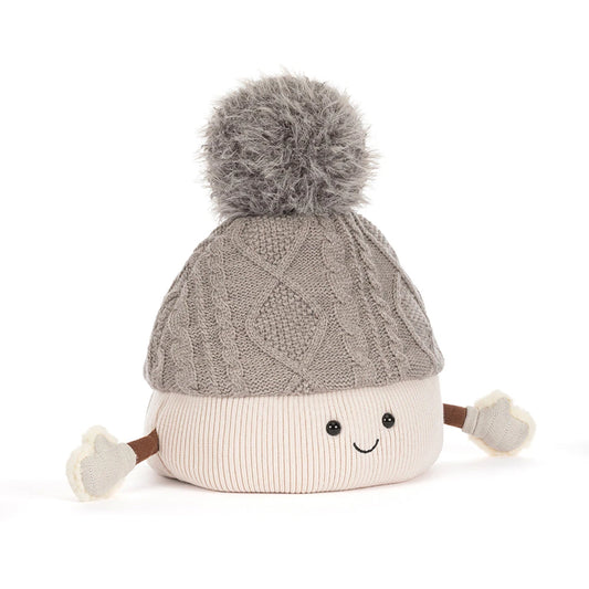 A plush baby hat with a gray cable-knit top, a cream ribbed bottom, a gray pom-pom, and small fabric hands and feet, shown on a white background.