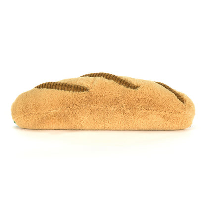 Tan slipper with brown interior on a white background