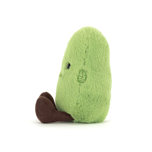 Plush avocado toy on a white background