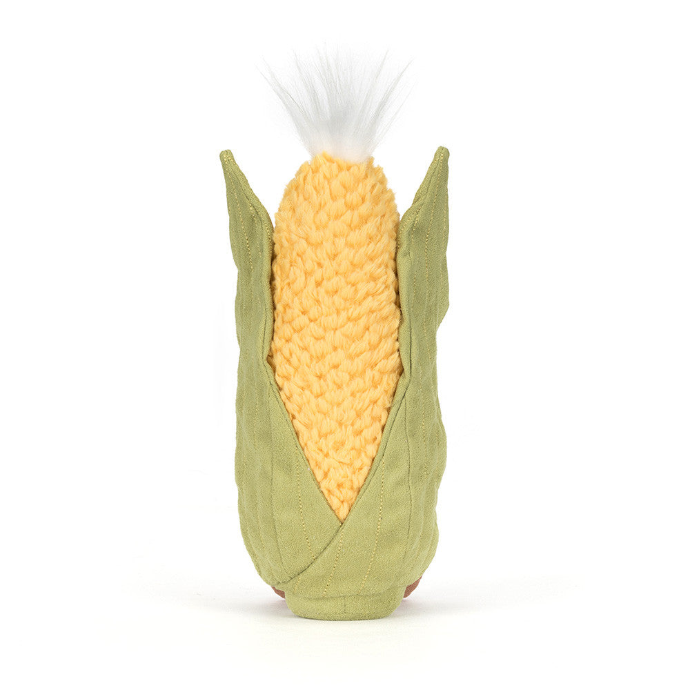 Corn-shaped plush toy with green husk on a white background