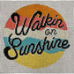 Cross-stitched design with 'Wakein for Sunshine' text on a grid background
