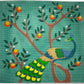 Needlepoint canvas with two peacocks and an orange tree